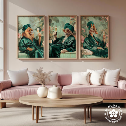 a living room with a pink sofa and a wooden coffee table. Above the sofa, there are three framed paintings depicting animals in green robes, each holding a wine glass.