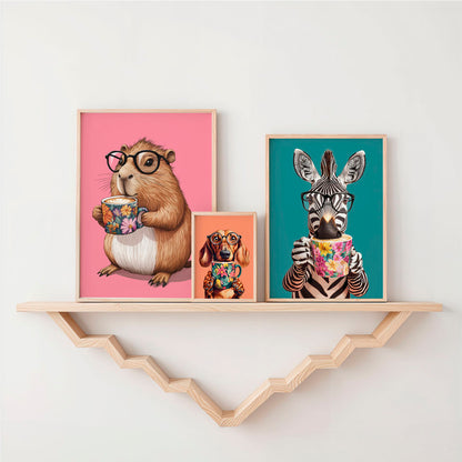 a shelf with three pictures of animals on it