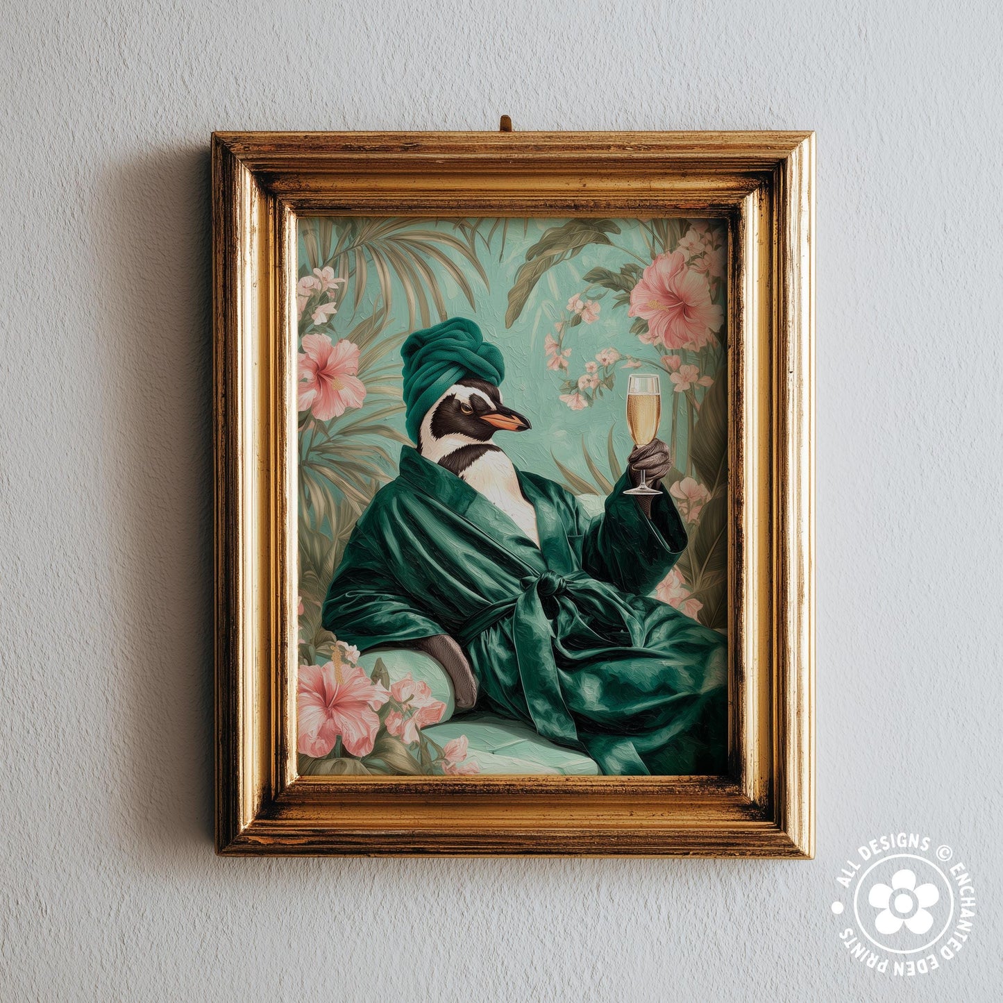 A framed painting depicting a penguin wearing a green robe and holding a glass of champagne, surrounded by tropical foliage and pink flowers.