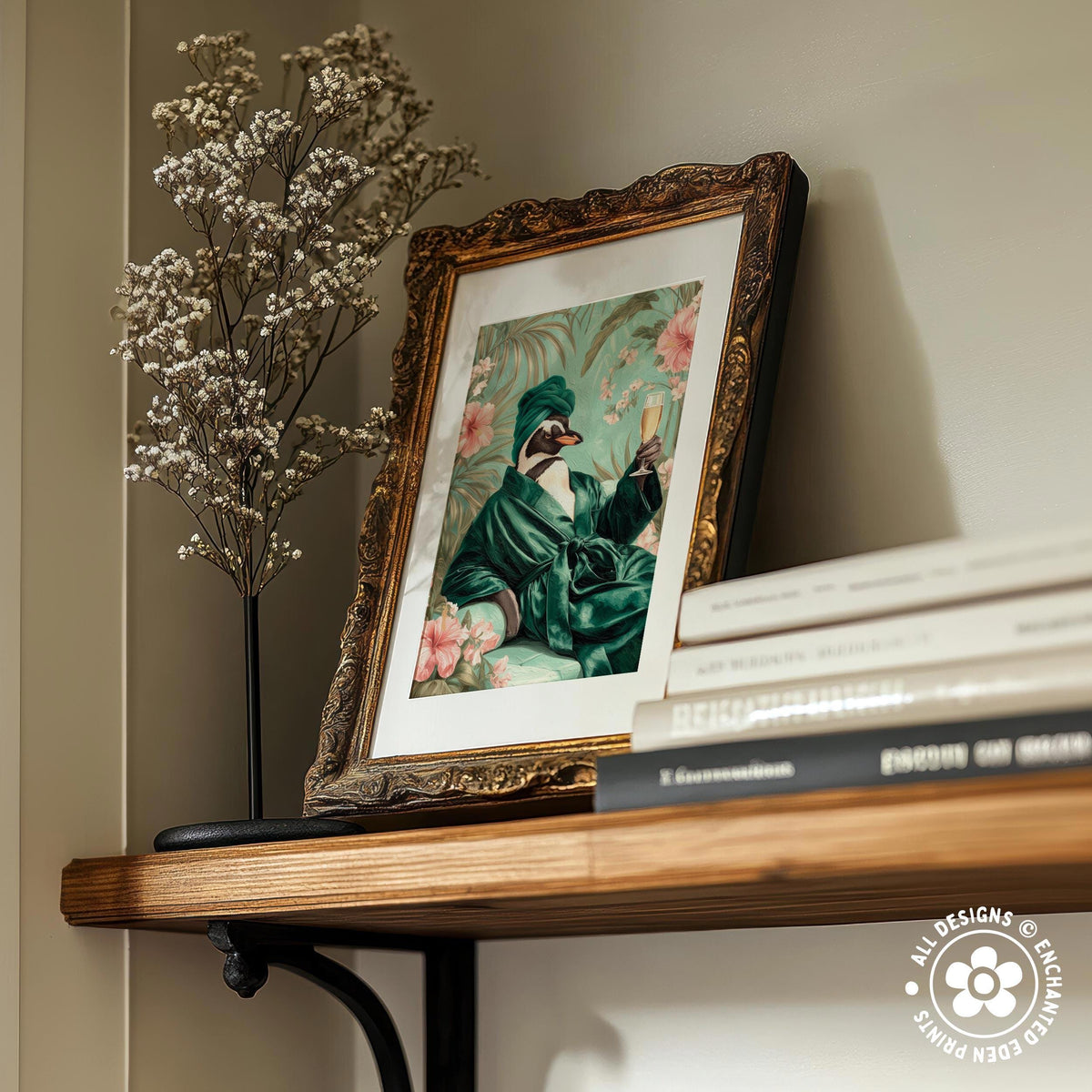 a wooden shelf with a framed painting of a penguin, a vase of white flowers, and a stack of books.