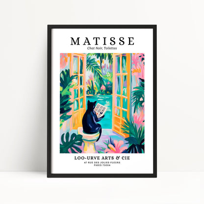 The image is a framed poster featuring a colorful illustration of a cat sitting on a toilet and reading a newspaper, surrounded by tropical plants and flowers.