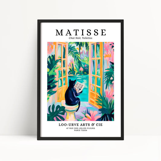 The image is a framed poster featuring a colorful illustration of a cat sitting on a toilet and reading a newspaper, surrounded by tropical plants and flowers.