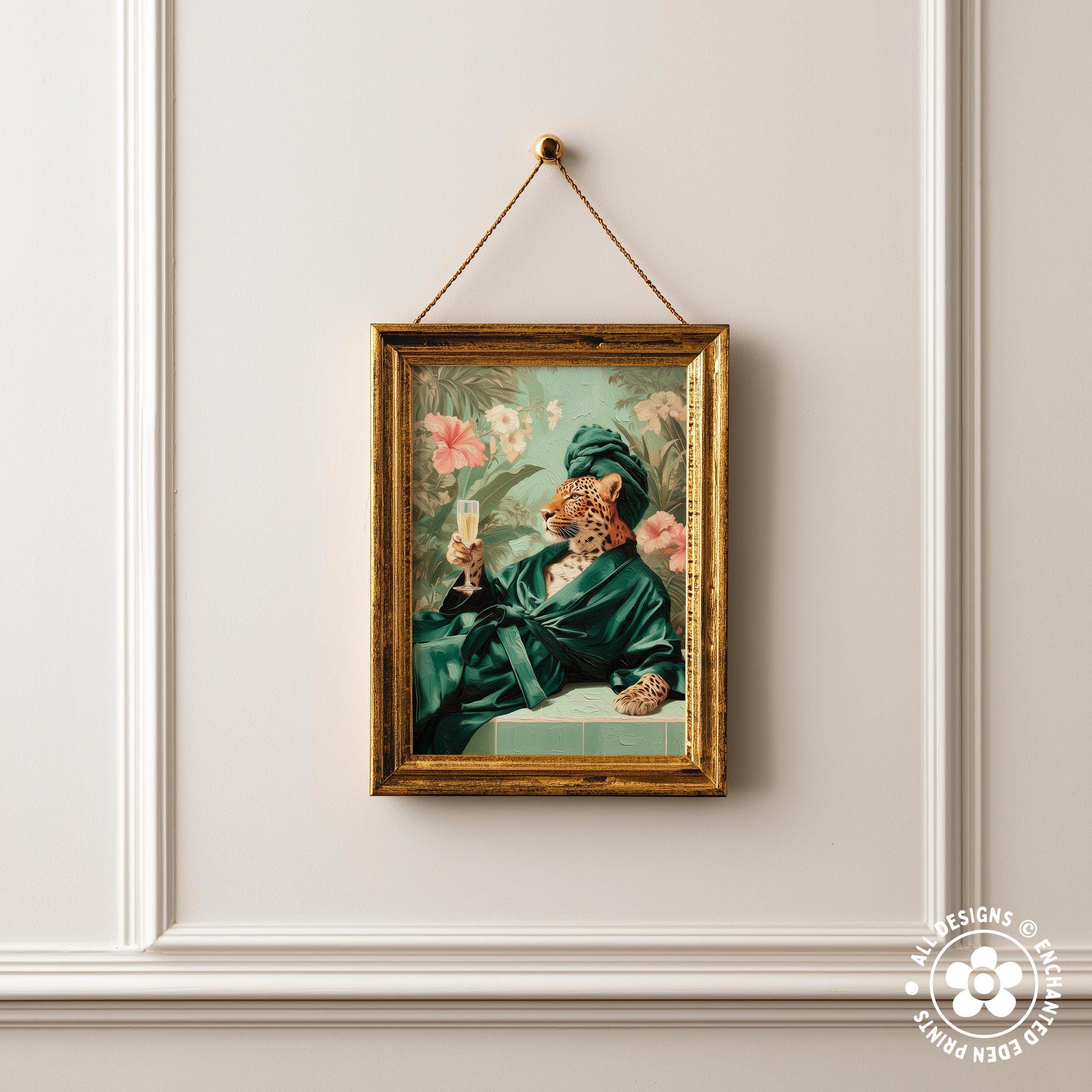 a framed painting of a cat wearing a green robe and holding a glass of wine, set against a floral background.