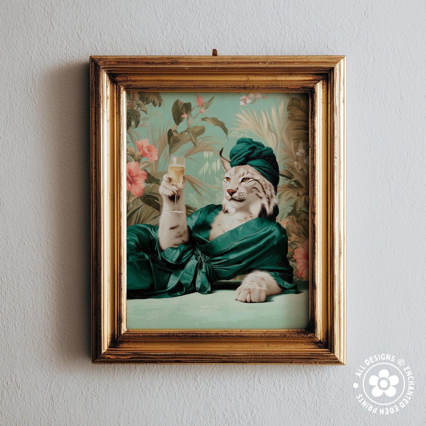 A framed image of a cat wearing a green robe and holding a glass of wine, set against a tropical floral background.