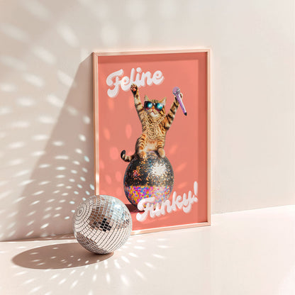 a picture of a cat sitting on top of a disco ball