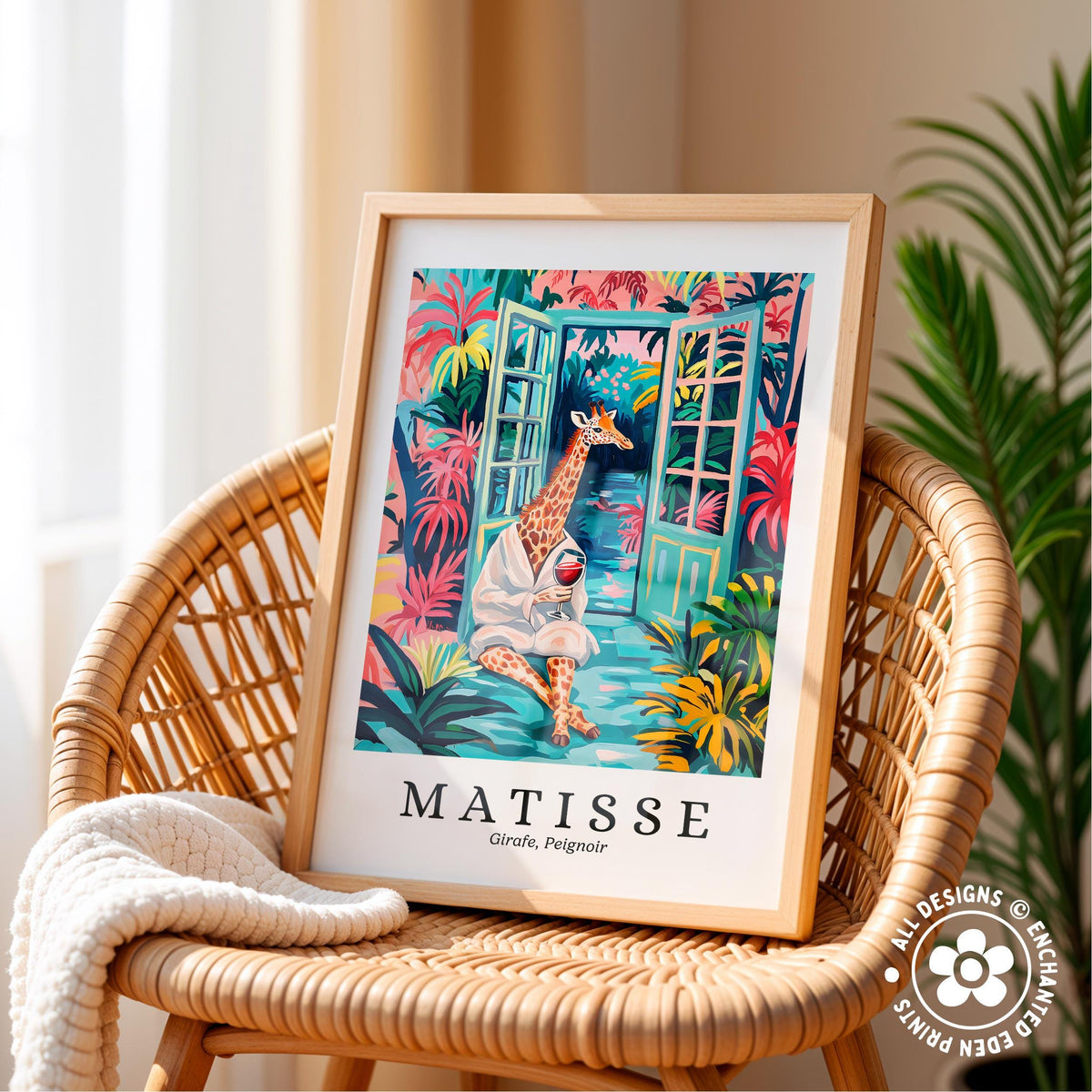 A framed print of a giraffe in a tropical setting, with a colorful and vibrant illustration, is displayed on a wicker chair.