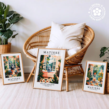 three framed prints of the famous painting "Matisse" by the artist Jean-Michel Basquiat, displayed on a white floor in front of a wicker chair.