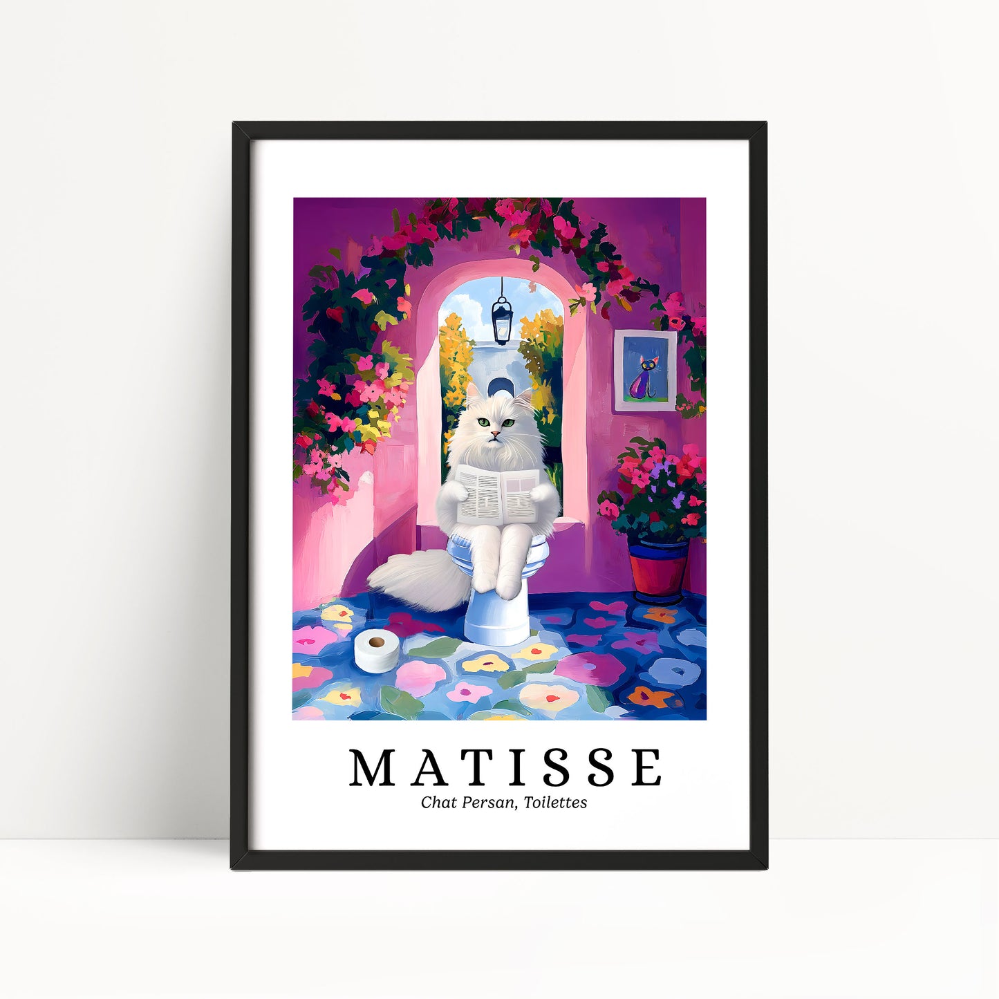 A framed poster depicting a white cat sitting on a toilet and reading a newspaper, surrounded by a colorful floral and pink-walled interior.