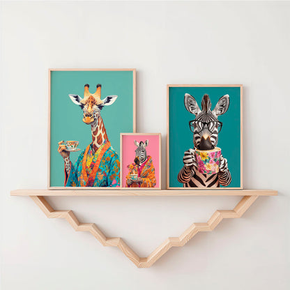 a couple of pictures of giraffes on a shelf