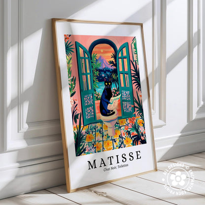 A framed poster of a cat sitting on a toilet in a tropical setting, with a colorful and vibrant illustration.