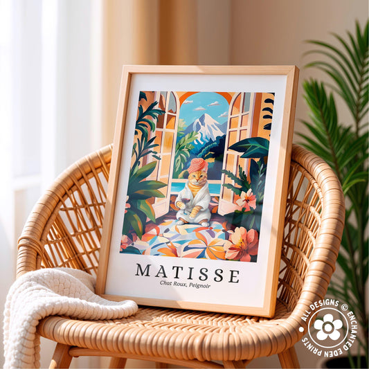 A framed print of a colorful illustration depicting a cat sitting in a tropical setting, with a mountain in the background.