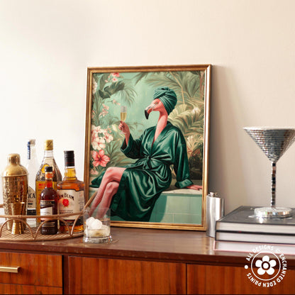 a framed painting of a woman in a green bathrobe holding a glass of wine, surrounded by tropical foliage. The painting is displayed on a wooden cabinet, with various bottles of alcohol and a cocktail shaker visible on the countertop.