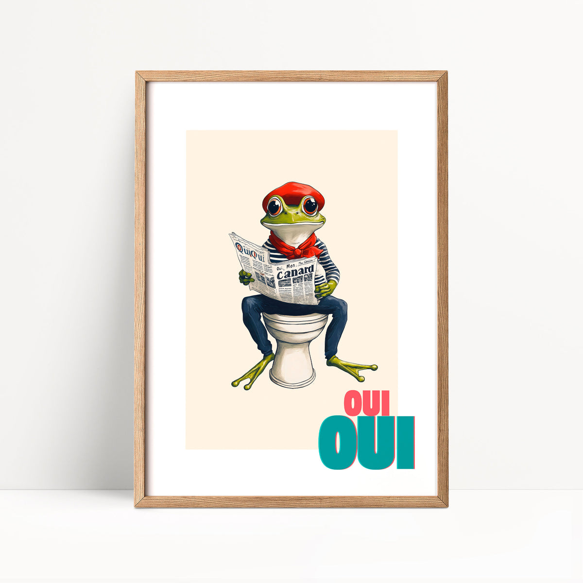 A framed illustration of a frog sitting on a toilet and reading a newspaper, with the text "oui oui" displayed below the image.