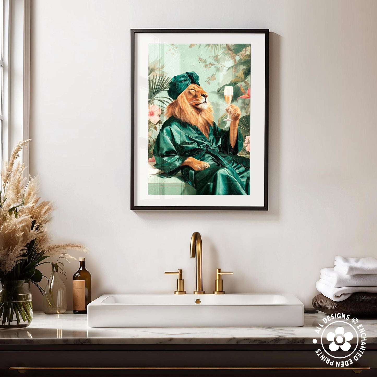 a framed painting of a lion wearing a green robe and hat, holding a wine glass, with a white sink and gold faucet in the foreground.