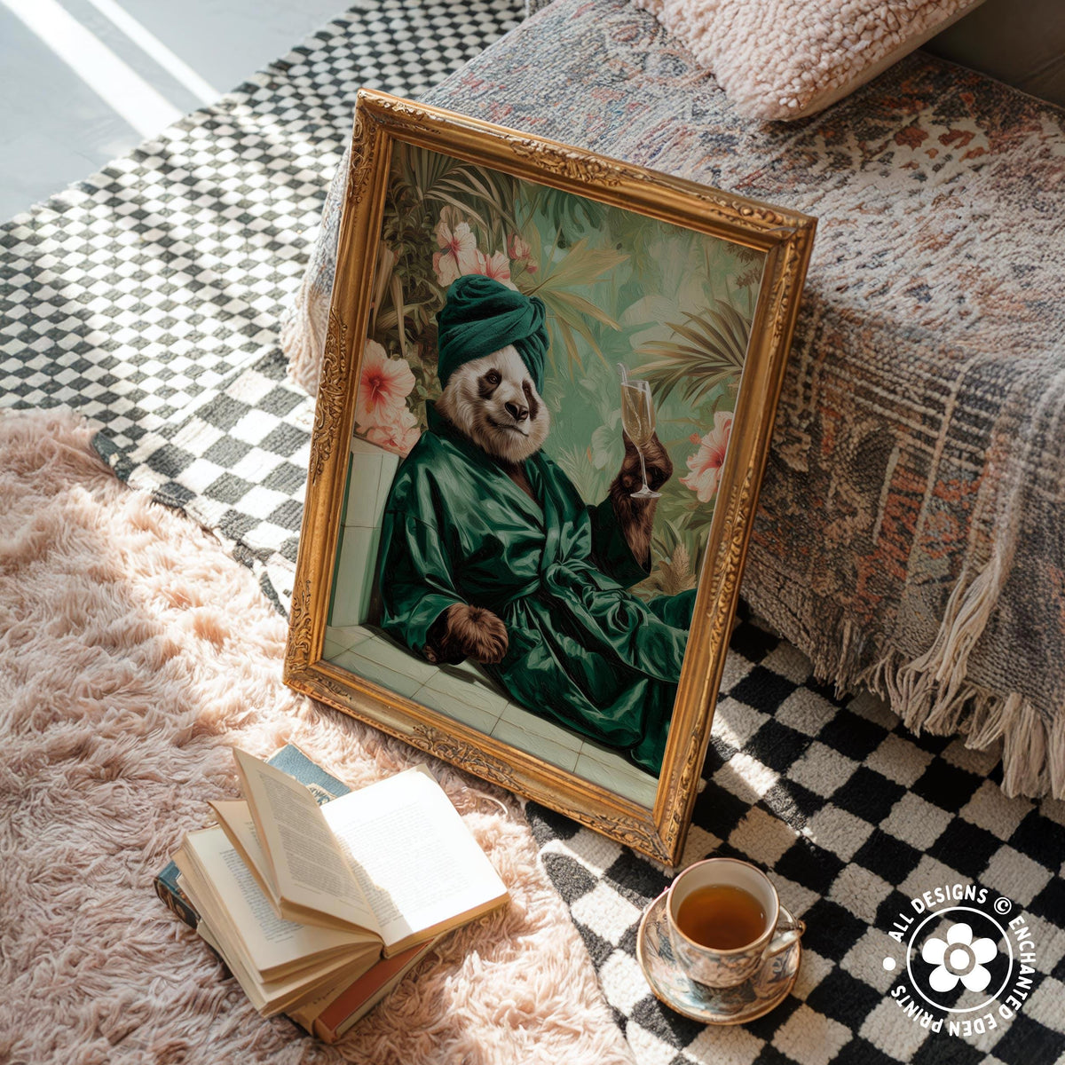 a panda wearing a green robe and holding a cup of tea, sitting on a pink rug next to a stack of books and a cup of tea.