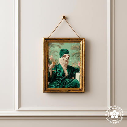 a framed painting of a bearded man wearing a green robe, sitting in a chair and holding a drink.