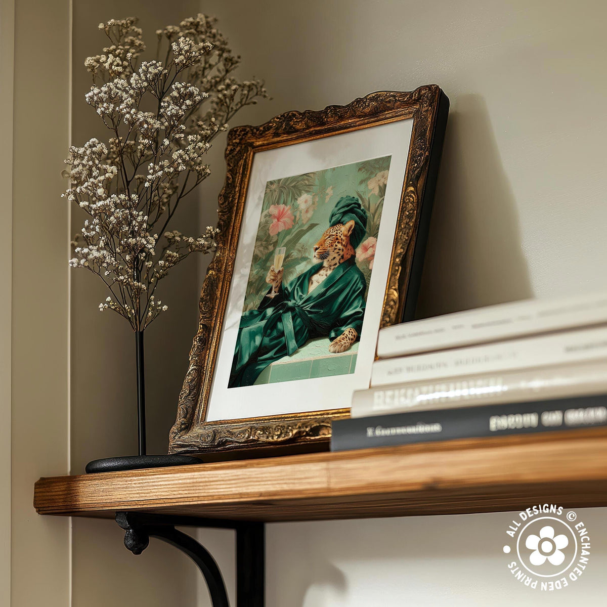 a wooden shelf with a framed painting of a person in a green robe, a vase of white flowers, and a stack of books.