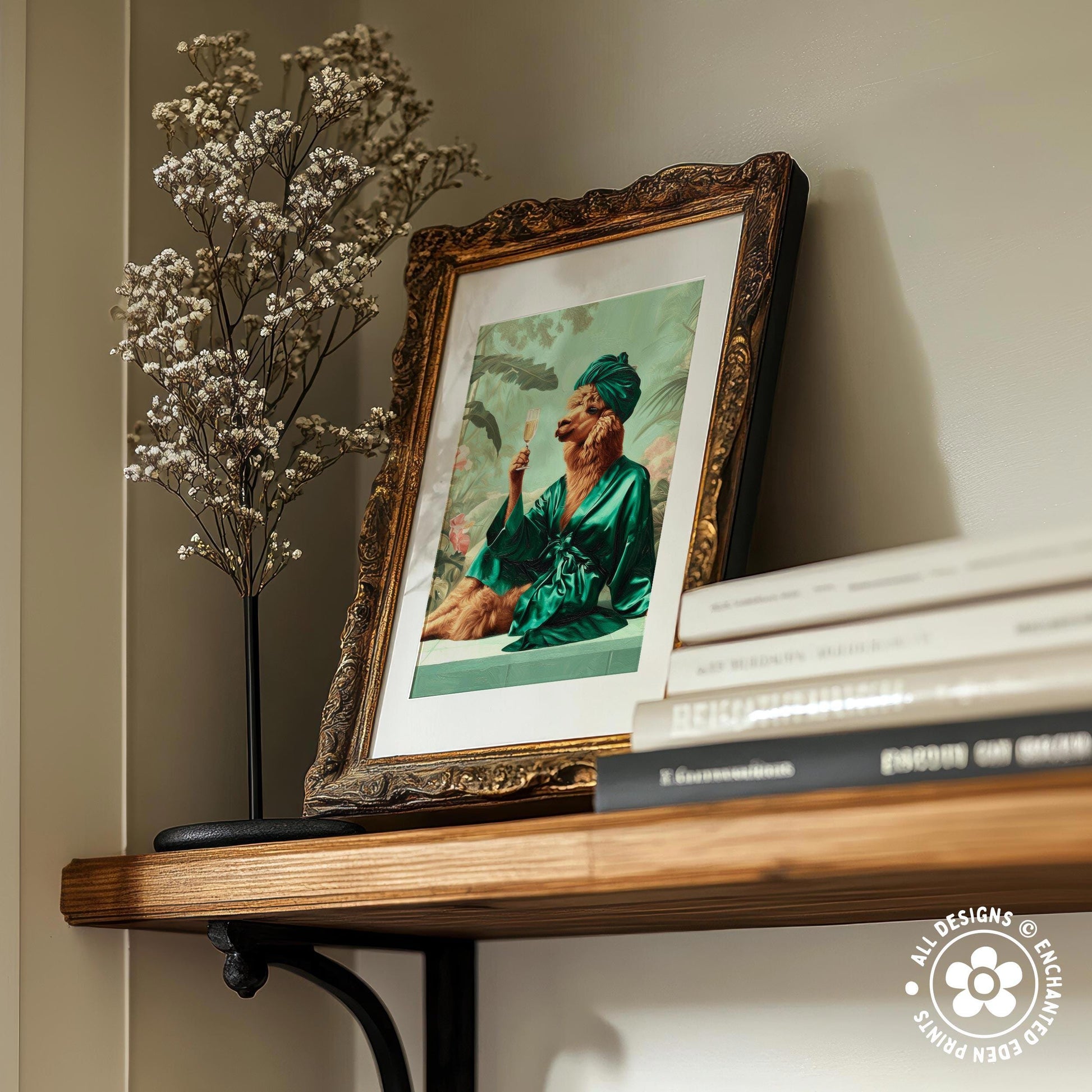 a framed picture of a dog wearing a green robe, sitting on a wooden shelf next to a vase of white flowers.