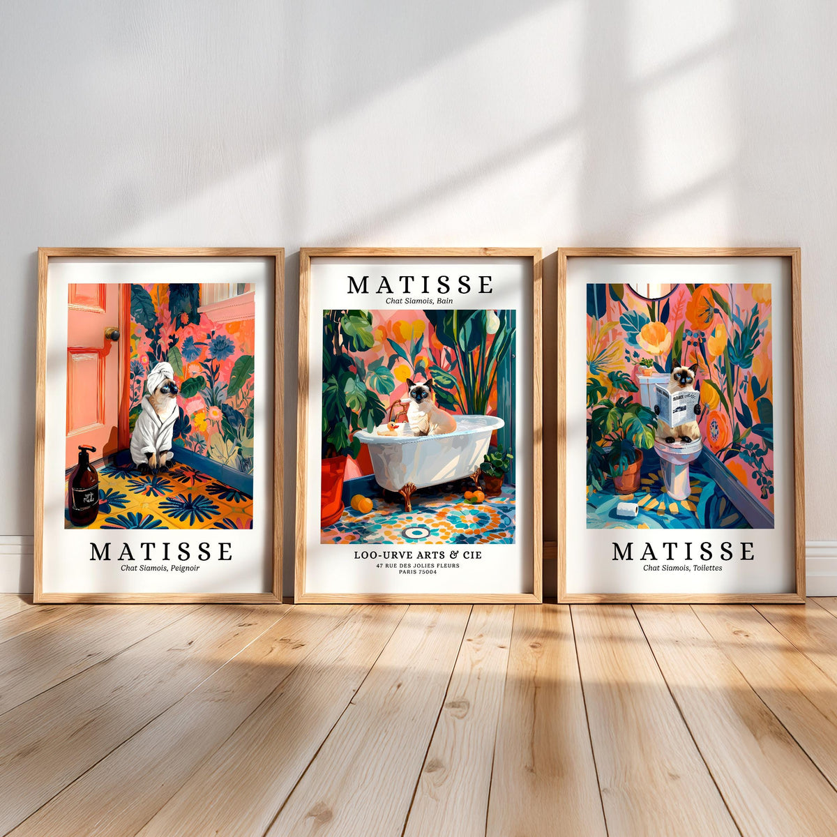 three framed artworks by the famous French artist Matisse, each depicting a different scene with a cat.