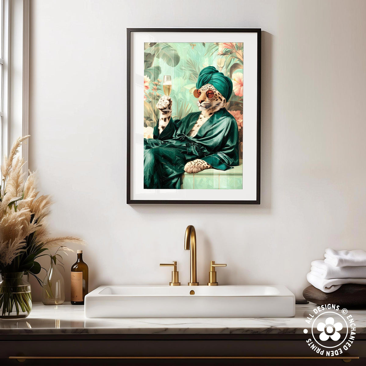 a framed picture of a cat wearing a green robe and sunglasses, sitting on a bench and holding a glass of wine.