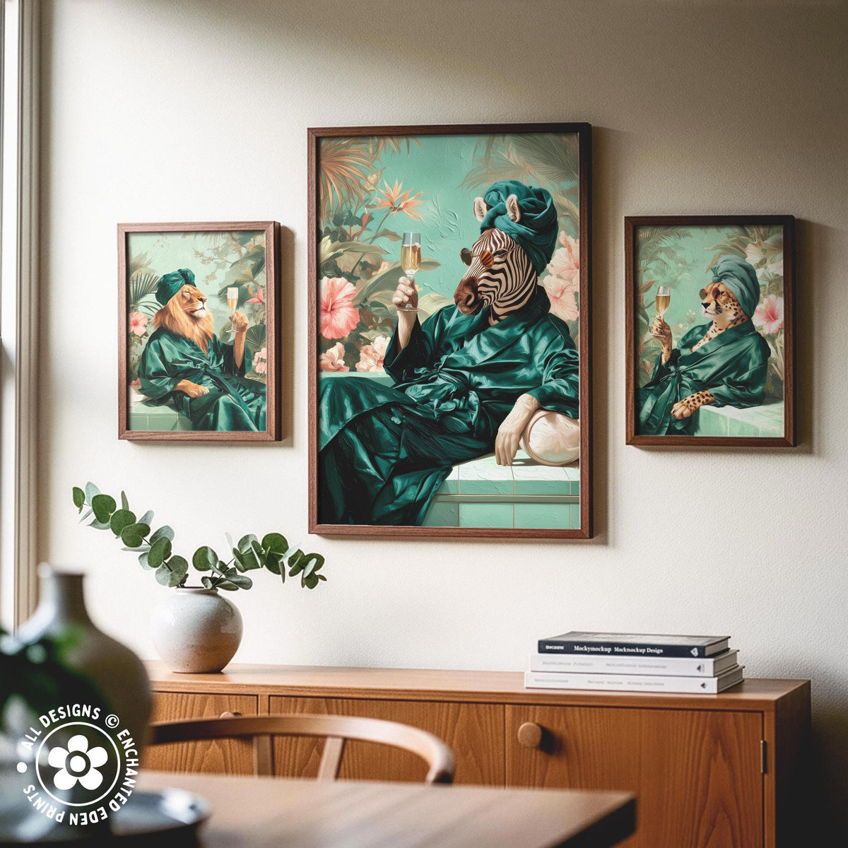 a collage of three framed paintings on a wall, depicting a zebra wearing a green robe and holding a glass of wine, a lion in a green robe holding a wine glass, and a tiger in a green robe holding a wine glass. The paintings are arranged in a row, creating a visually appealing display.