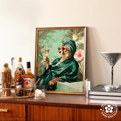 a framed painting of a leopard wearing a green robe and holding a glass of wine, surrounded by various bottles of alcohol and a cocktail shaker on a wooden surface.