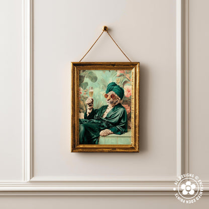 a framed painting of a cat wearing a green robe and holding a glass of wine.
