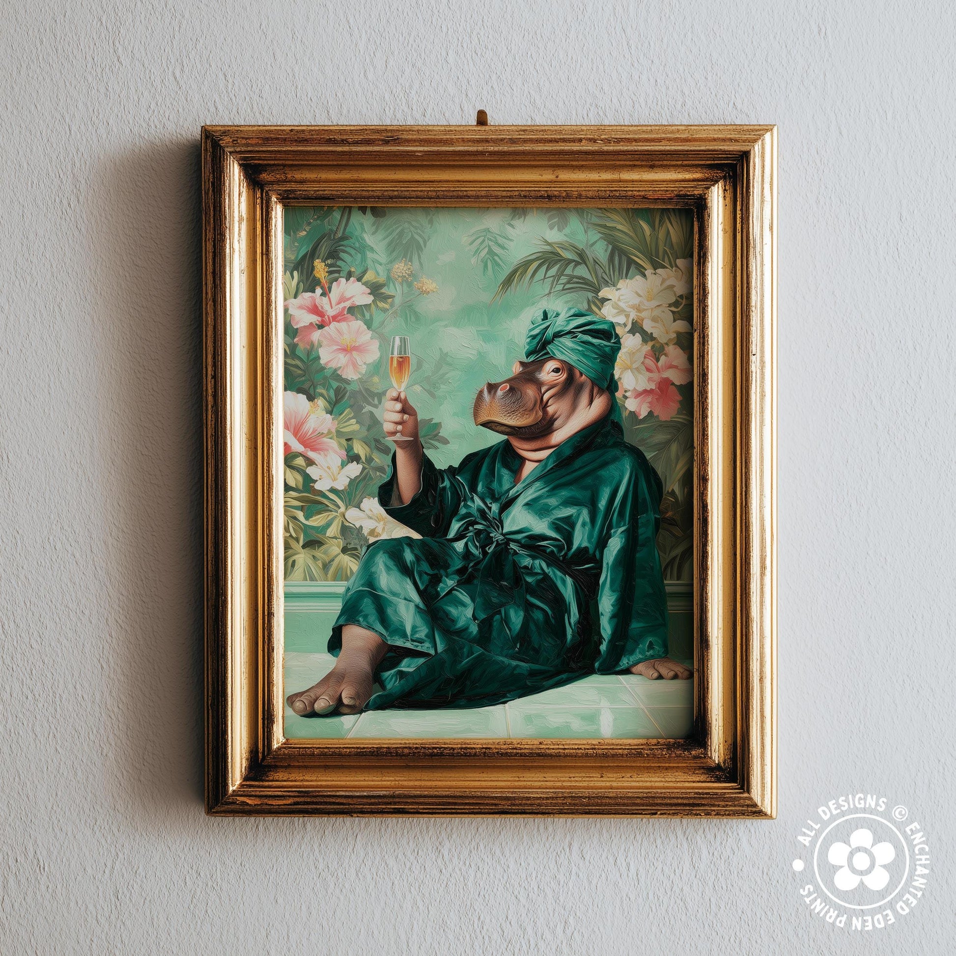 A framed painting depicting a hippopotamus wearing a green robe and holding a glass of champagne, surrounded by a tropical floral background.