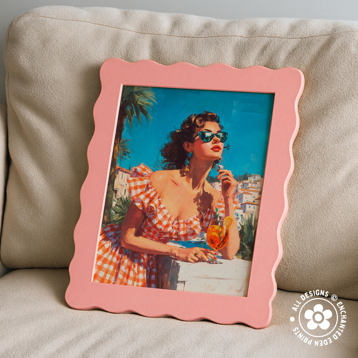 A framed painting of a woman in a red and white checkered dress, wearing sunglasses, holding a drink, and looking out at a cityscape.