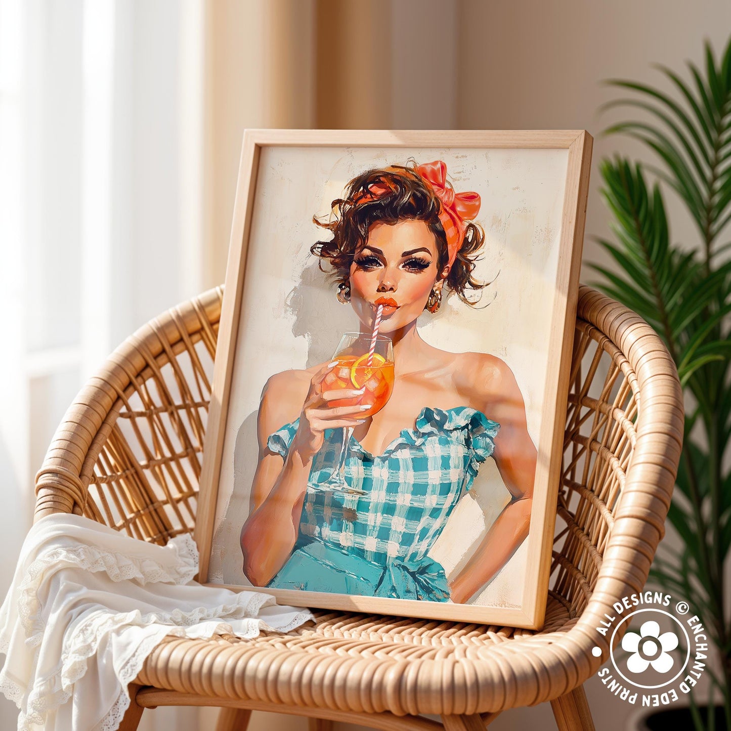 A framed illustration of a woman in a blue and white checkered dress holding a glass of orange juice, sitting on a wicker chair.