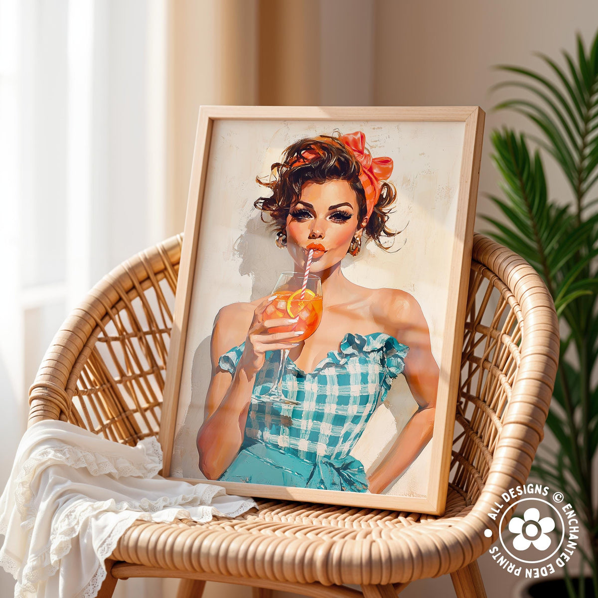 A framed illustration of a woman in a blue and white checkered dress holding a glass of orange juice, sitting on a wicker chair.