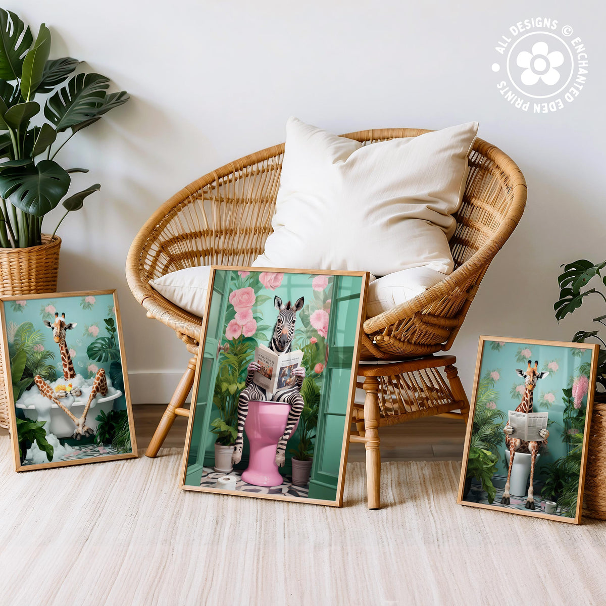 three framed artworks depicting giraffes in various whimsical and humorous situations, such as sitting on a toilet, reading a book, and relaxing in a bathtub.