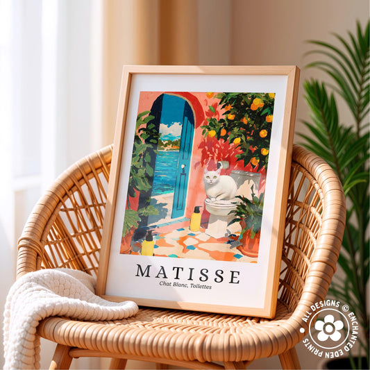 A framed print of a colorful painting depicting a cat sitting on a toilet in a tropical setting, with a blue door and orange flowers in the background.