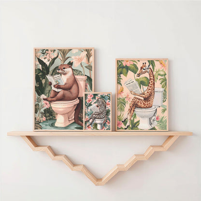 two pictures of animals on a shelf above a toilet