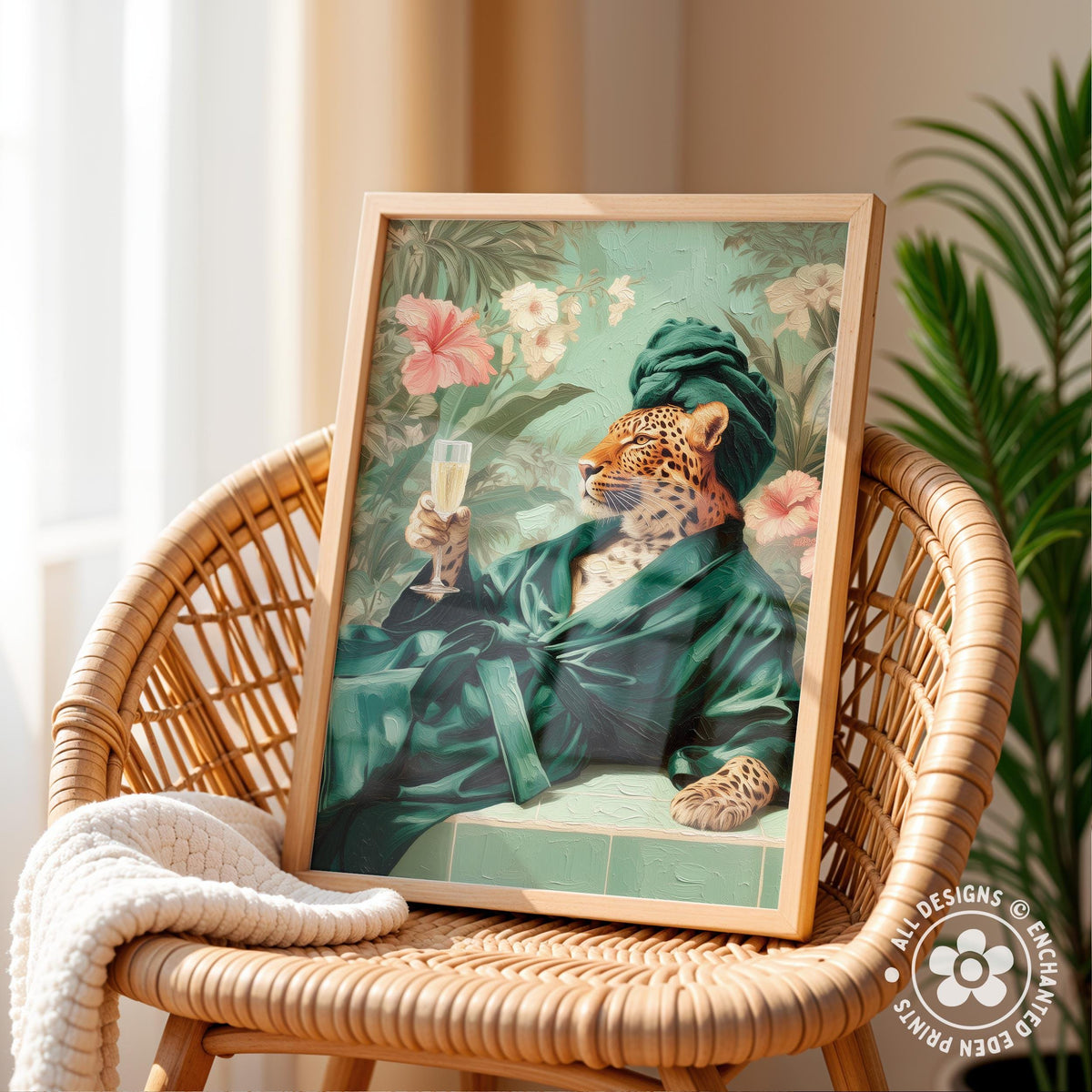 A framed print of a leopard wearing a green robe and holding a glass of wine, set against a tropical floral background, is displayed on a wicker chair.
