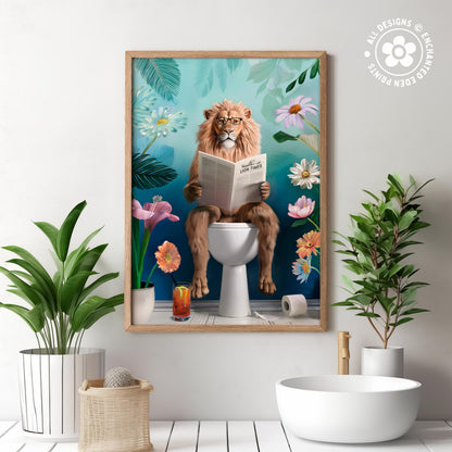 The image is a framed artwork depicting a lion sitting on a toilet and reading a newspaper, surrounded by various plants and flowers.
