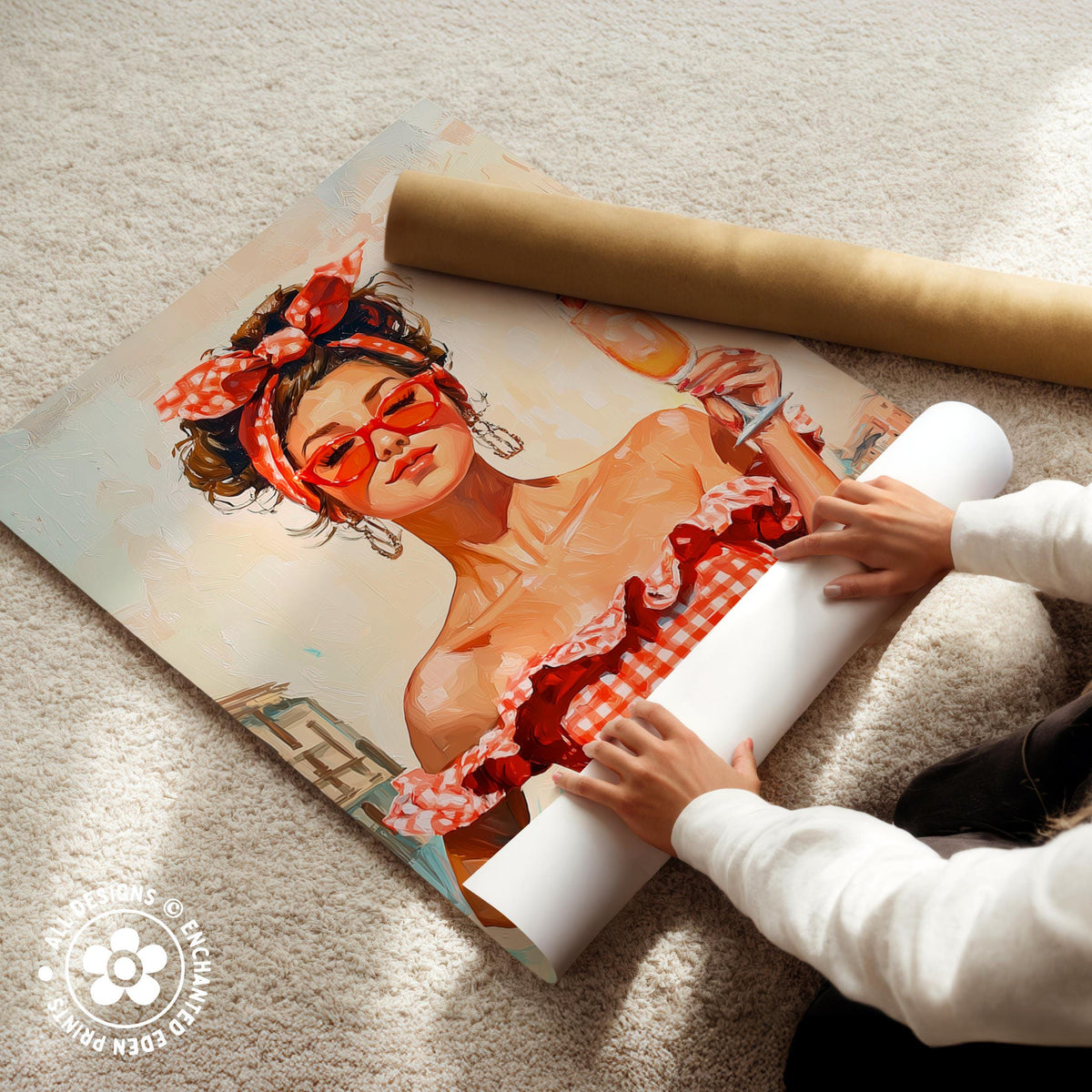 A person is carefully handling a rolled-up poster featuring an illustration of a woman with a red headband and a red and white checkered dress.