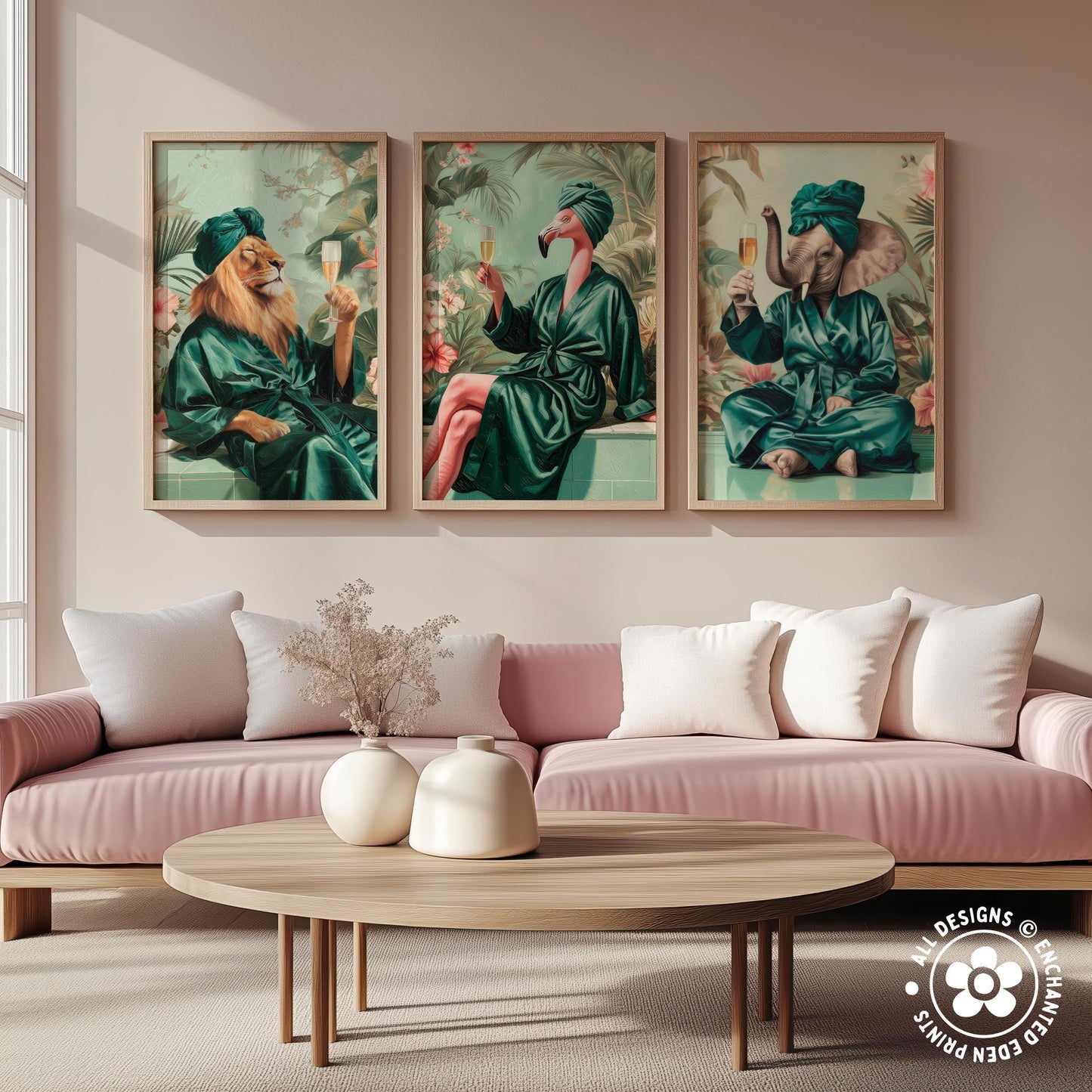 a living room with a pink sofa and a wooden coffee table. Above the sofa, there are three framed paintings depicting animals in green robes, including a lion, a flamingo, and an elephant.
