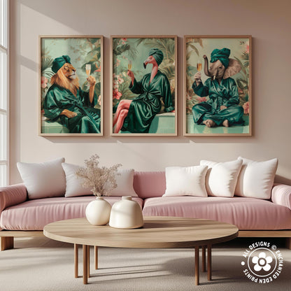 a living room with a pink sofa and a wooden coffee table. Above the sofa, there are three framed paintings depicting animals in green robes, including a lion, a flamingo, and an elephant.