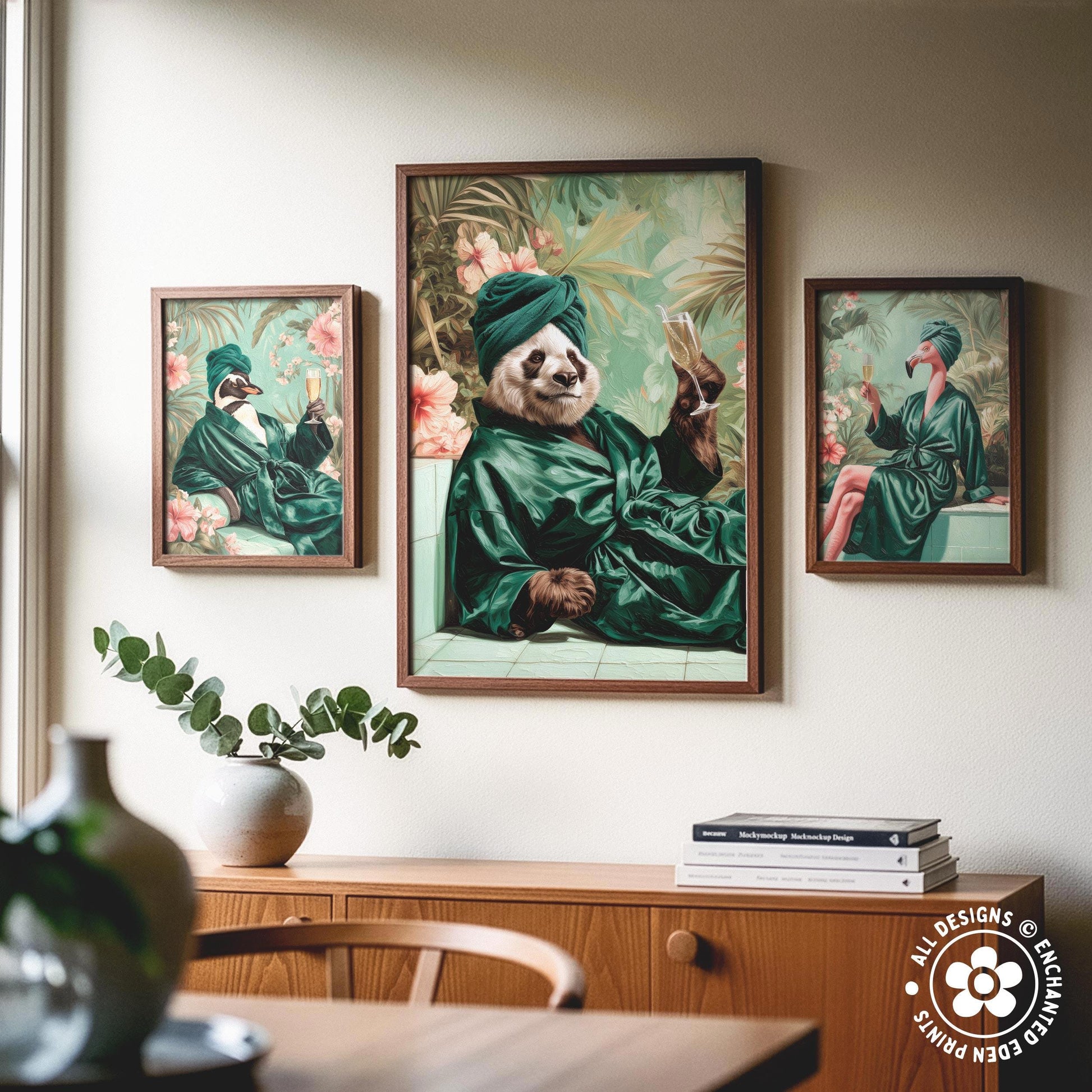 a panda bear wearing a green robe and holding a drink, surrounded by tropical foliage, with two framed paintings of people in green robes hanging on the wall above a wooden cabinet.