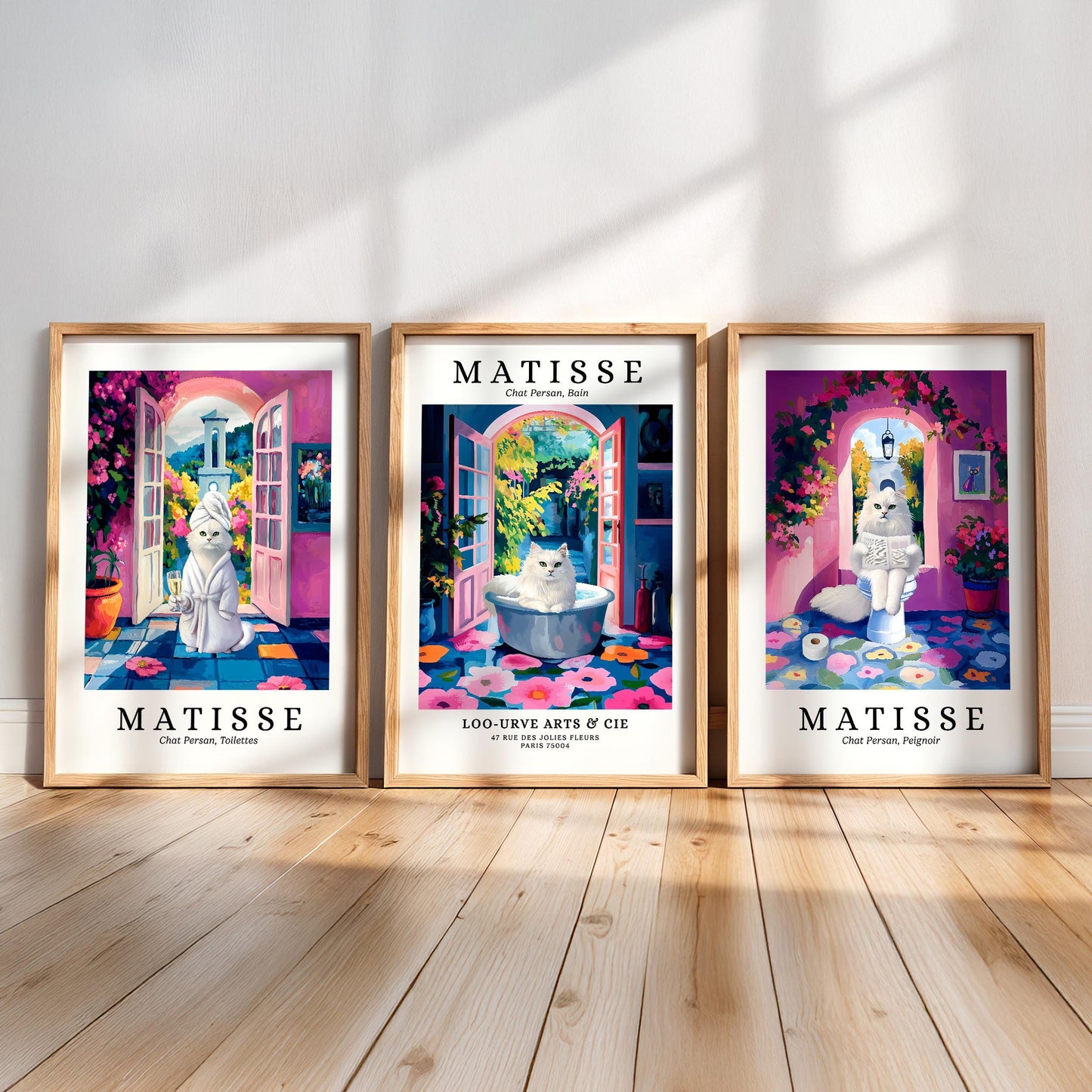 three framed artworks by the famous French artist Matisse, each depicting a different scene. The artworks are arranged in a row on a wooden floor, showcasing the artist's unique style and creativity.