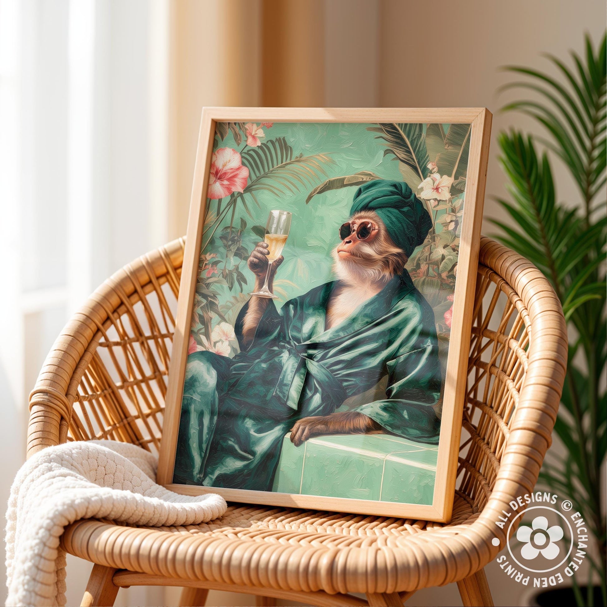 A framed painting depicting a monkey wearing a green robe and holding a glass of wine, sitting on a wicker chair in a tropical setting.