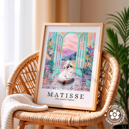 A framed painting of a cat sitting on a colorful rug, with a window and plants in the background, is displayed on a wicker chair.