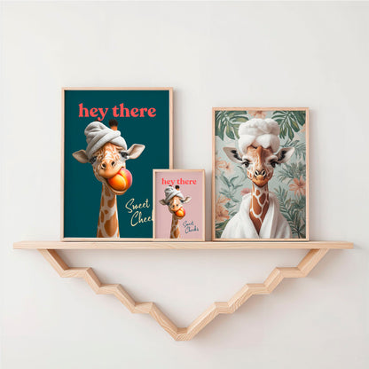 two giraffes on a shelf next to a picture of a giraf