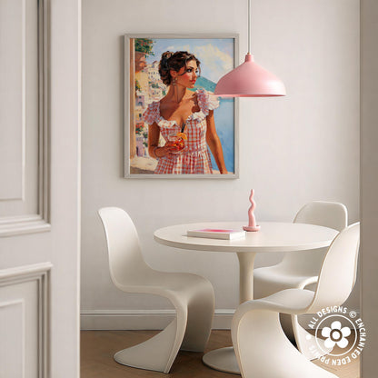 a dining area with a white table and chairs, a framed painting of a woman in a pink dress hanging on the wall, and a pink pendant lamp hanging above the table.