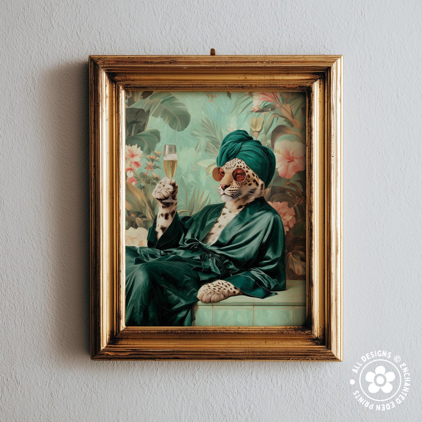 A framed print depicting a leopard wearing a green robe and holding a glass of champagne, set against a tropical background.