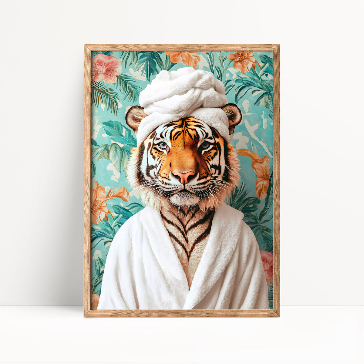 A framed print depicting a tiger wearing a white bathrobe and a white headband, set against a tropical floral background.