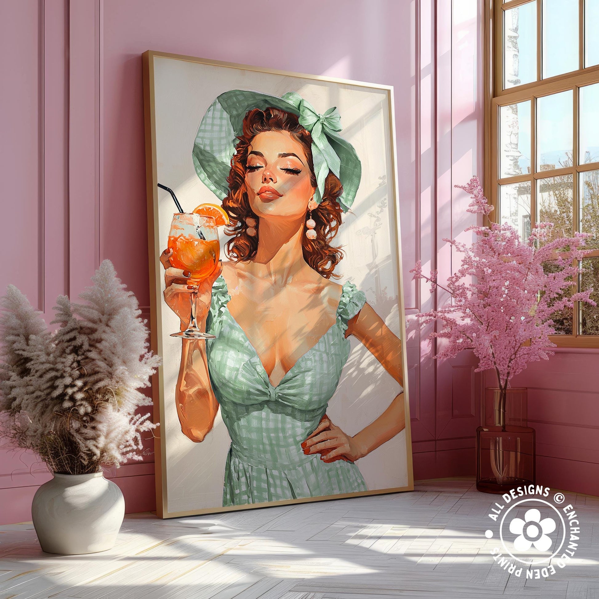 A framed painting of a woman in a green dress holding a drink, with a pink wall and a window in the background.