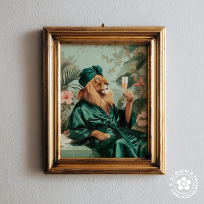 A framed painting depicting a lion wearing a green robe and holding a glass of champagne, surrounded by tropical foliage.