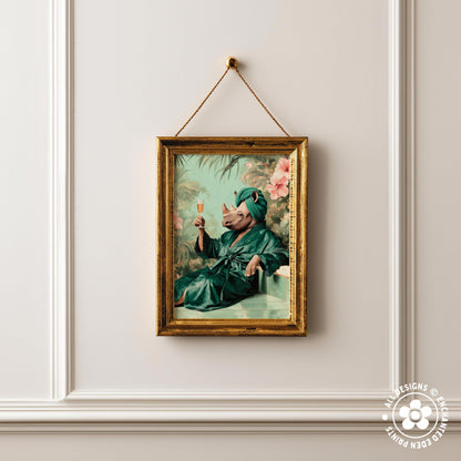 a framed painting of a person wearing a green robe and holding a glass of wine, set against a tropical background.